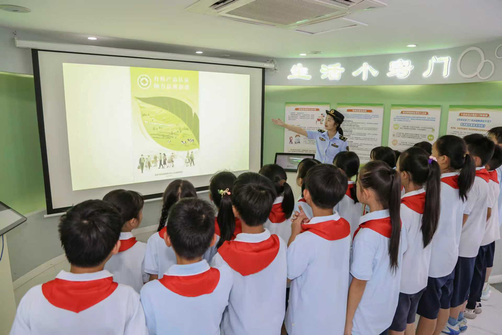 學生了解節約反浪費知識。王國洋攝